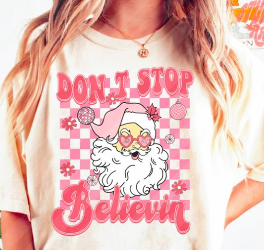 Don't Stop Believin' Santa Checkered Background Tee